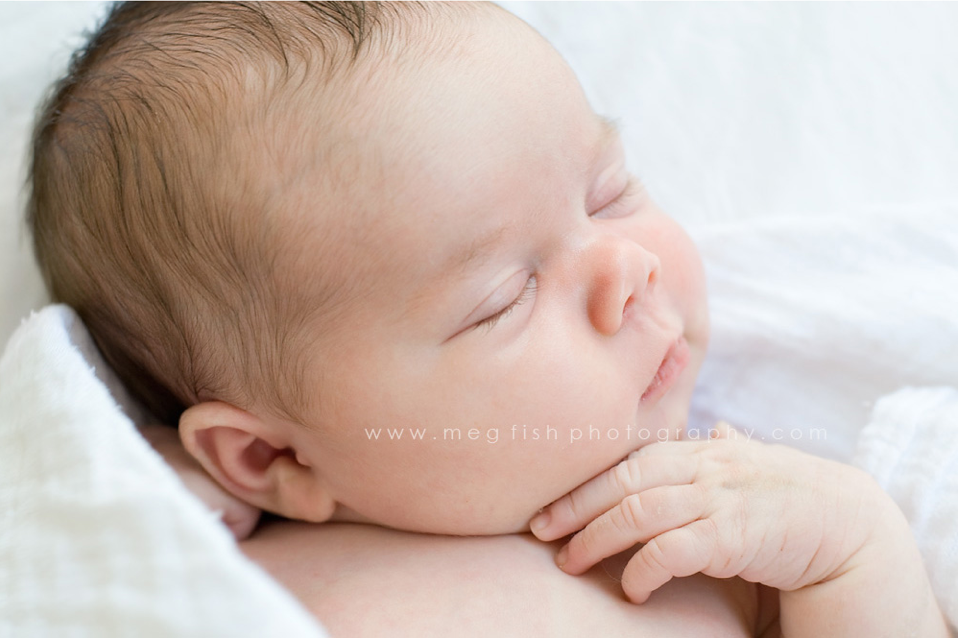 Meg Fish newborn babywearing
